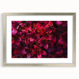 Botanical wall art print featuring a delicate floral and leaves design, framed with a silver mat, ideal for enhancing home decor with a touch of nature.