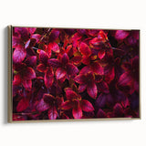 Framed wall art featuring a botanical design with vibrant green leaves against a gold background, showcasing elegance and natural beauty in home decor.