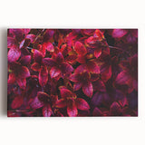 Stretched canvas wall art showcasing a vibrant botanical leaves design in green and gold tones, perfect for adding a natural touch to home decor.