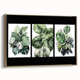 Framed wall art featuring a botanical design with vibrant flowers and leaves, set on a gold background. Ideal for home decor enthusiasts seeking a nature-inspired aesthetic.