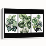 Framed canvas wall art showcasing a botanical design with vibrant flowers and intricate leaves, displayed against a white background for a fresh, modern look. Perfect for adding a touch of nature to any home decor.