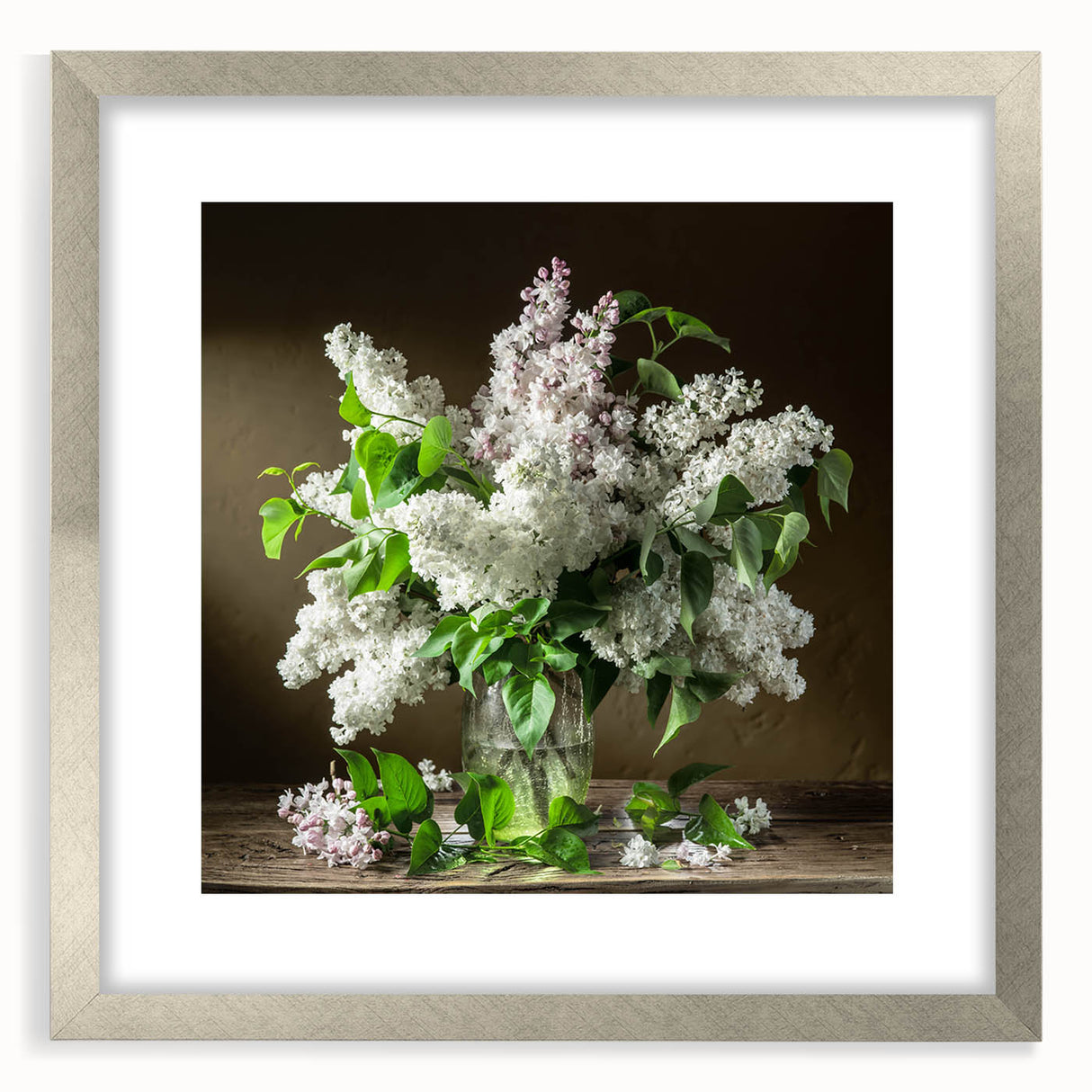 Elegant silver-framed wall art showcasing a botanical design of lilacs, featuring intricate floral details and a white mat, perfect for home decor enhancement.