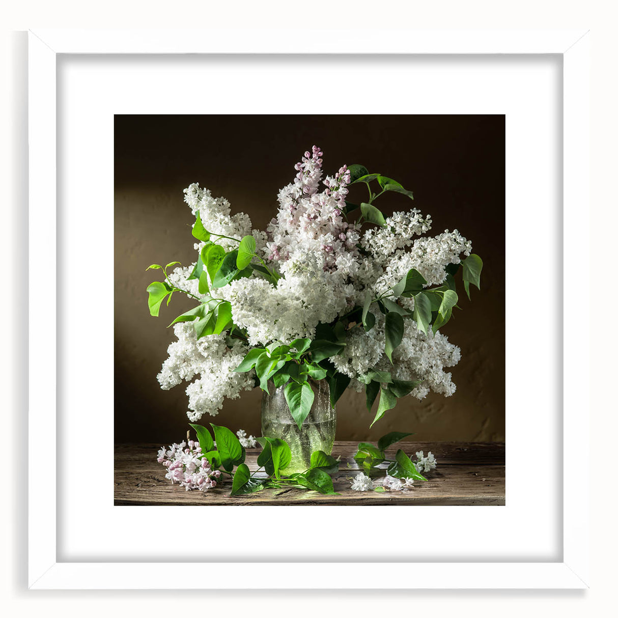 Framed botanical wall art featuring delicate lilacs in soft purple hues, set against a white background with a sleek matte finish, perfect for home decor.