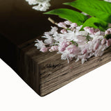 Close-up of a vibrant lilac botanical design on stretched canvas, showcasing intricate floral details and rich colors, ideal for home decor enhancement.