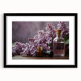 Black-framed wall art showcasing a vibrant lilac botanical design, elegantly matted for a refined look, perfect for home decor and floral enthusiasts. Ideal for brightening living spaces.