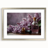 Framed wall art featuring a botanical design of lilacs in soft purple and green hues, elegantly matted and presented in a sleek silver frame, perfect for home decor.