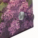 Close-up of an elegant lilac botanical design wall art piece, featuring vibrant purple and green hues on acrylic glass, perfect for home decor enhancement.