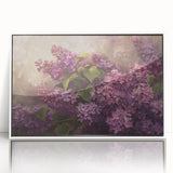 Framed wall art showcasing a vibrant lilac botanical design, featuring intricate floral details in soft purple tones, elegantly displayed in a white frame.