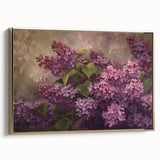 Framed canvas wall art showcasing a vibrant lilac floral design, set in a sleek gold frame. Perfect for home decor, adding elegance and a touch of nature.