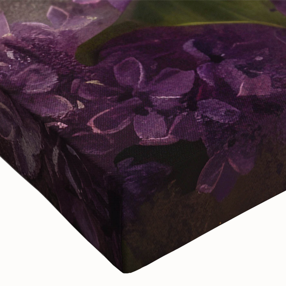 Close-up of a vibrant lilac floral design on stretched canvas, showcasing intricate details and colors perfect for botanical wall art decor in modern interiors.