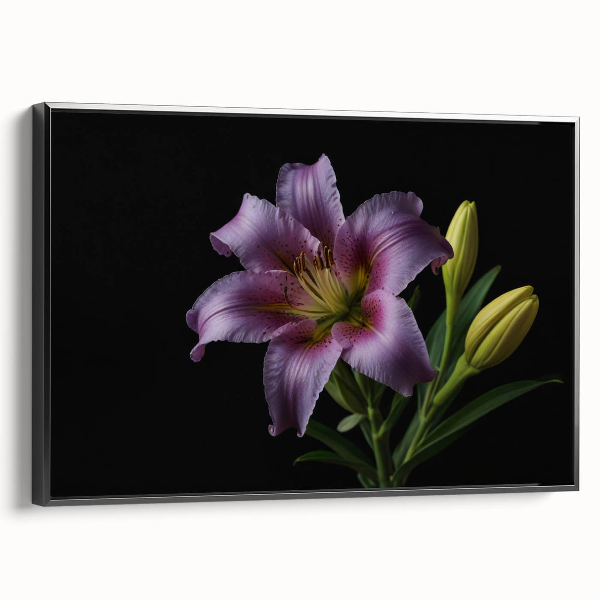 Framed botanical wall art featuring a vibrant lily design on canvas, displayed in a sleek black frame, showcasing elegant floral details and textures. Ideal for home decor enthusiasts.