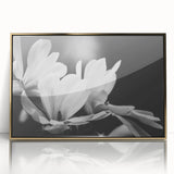Framed wall art showcasing a botanical magnolia design in elegant gold acrylic, perfect for enhancing home decor with a touch of natural beauty. The artwork features intricate details of the magnolia flower against a soft background, ideal for floral enthusiasts and modern interiors.