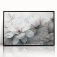 Framed wall art showcasing a botanical design of magnolia flowers in vibrant colors, featuring a sleek black frame that enhances its elegance. Ideal for home decor.