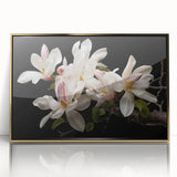 Framed wall art featuring a botanical magnolia design in elegant gold accents, showcasing vibrant floral details against a modern backdrop, perfect for home decor.