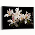 Framed black canvas wall art depicting a botanical magnolia design, showcasing intricate floral details and elegant colors, perfect for home decor enhancement.