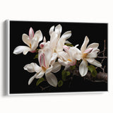 Framed botanical wall art featuring a magnolia design in soft pastel colors, displayed from a side view against a white background, perfect for home decor.