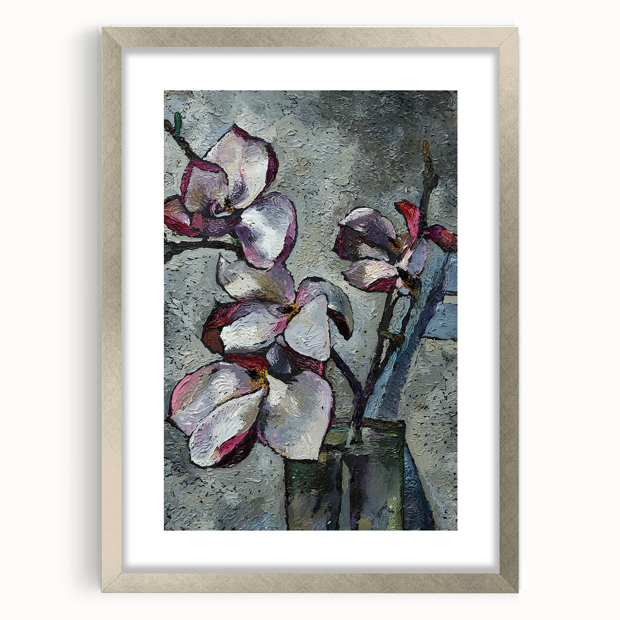 Botanical wall art featuring a silver-framed magnolia design with a mat, showcasing delicate pink and white flowers against a soft background, perfect for home decor.