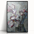 Framed wall art featuring a botanical magnolia design in a sleek black frame, showcasing vibrant colors and intricate details, perfect for home decor.