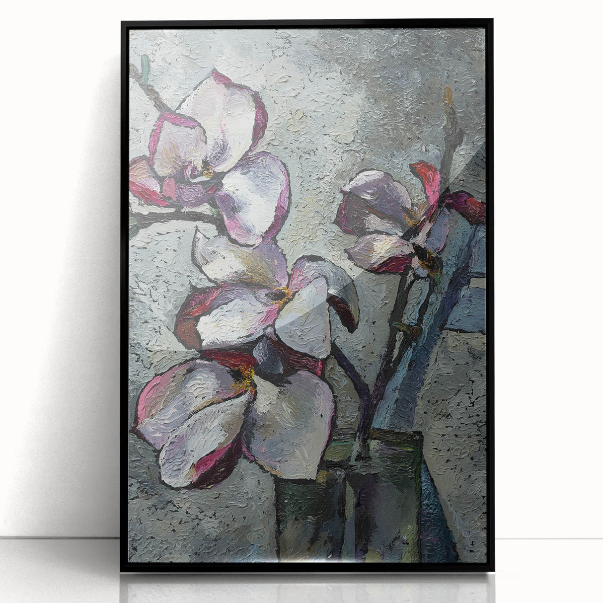 Framed wall art featuring a botanical magnolia design in a sleek black frame, showcasing vibrant colors and intricate details, perfect for home decor.