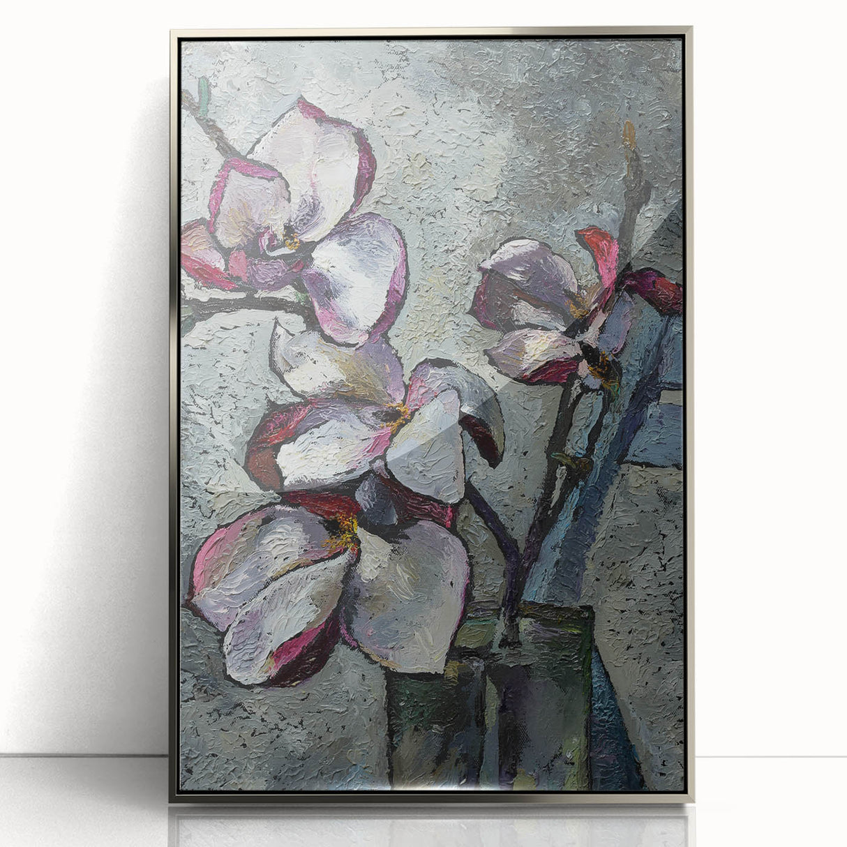 Framed wall art showcasing a stunning botanical magnolia design with vibrant colors and intricate details, presented in a sleek silver frame, perfect for home decor.