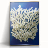 Framed wall art featuring a botanical design of marine plants in gold accents, showcasing intricate details and vibrant colors, ideal for coastal decor.