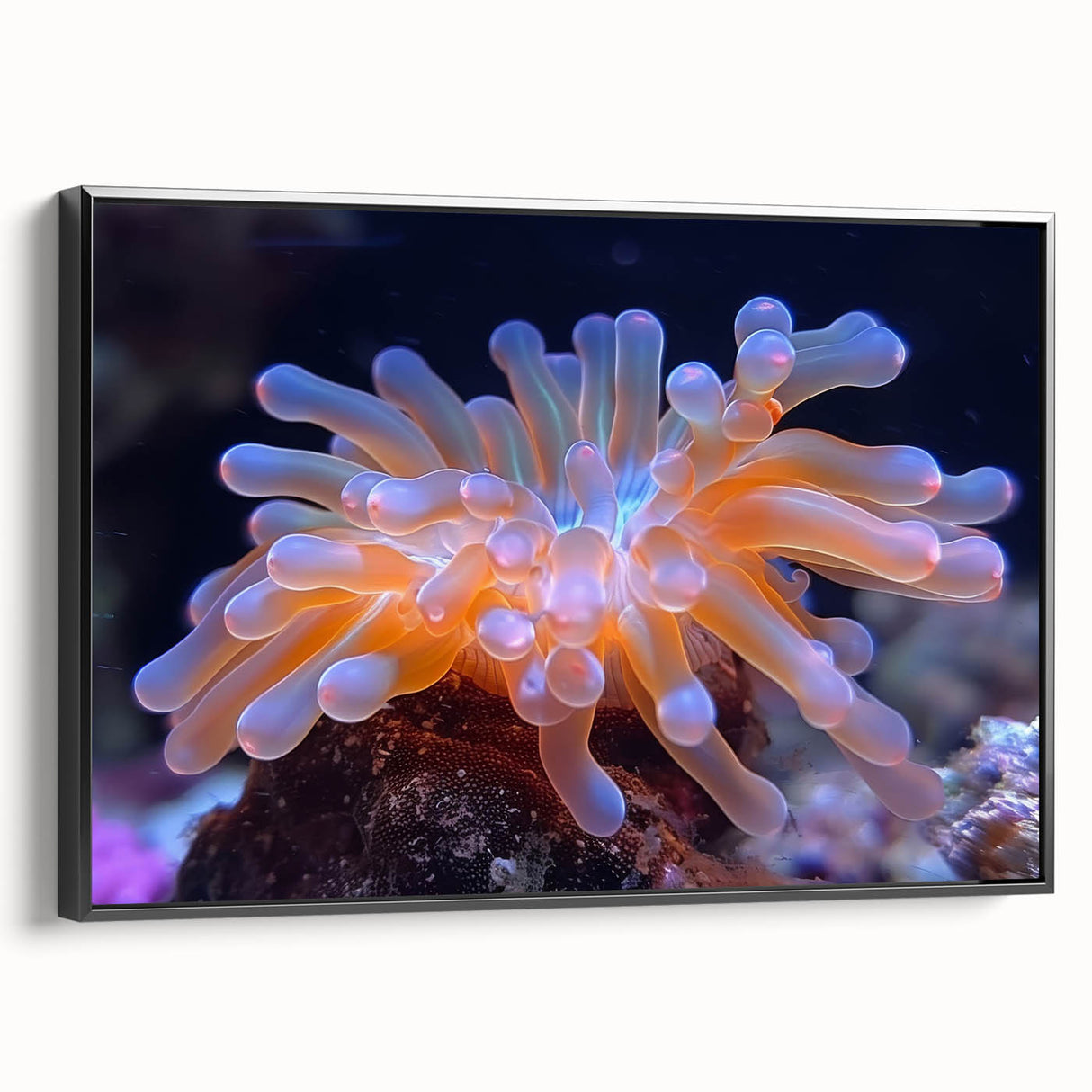 Framed wall art featuring a botanical design of marine plants in vibrant colors, displayed from the side to highlight its black frame and textured canvas surface.