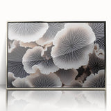 Framed wall art featuring a botanical marine plants design, showcasing intricate floral details in vibrant colors, elegantly displayed with a silver frame.
