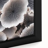 Close-up of a framed canvas wall art featuring a vibrant botanical design of marine plants, showcasing intricate details and vivid colors in a modern setting.