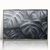 Framed botanical wall art featuring a Monstera plant design, set in a sleek silver frame with acrylic front for a modern touch, ideal for home decor.