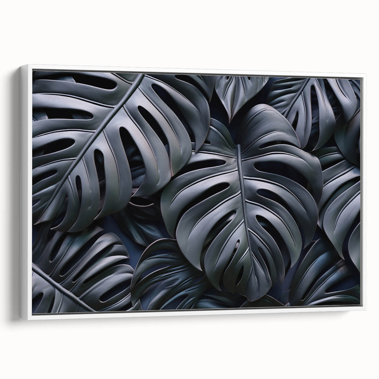 Framed botanical wall art featuring a Monstera plant design on canvas, showcasing vibrant green leaves against a white background, ideal for modern home decor.