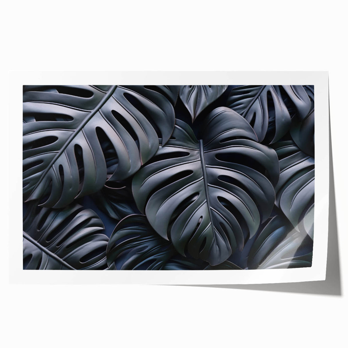 Botanical wall art print featuring a vibrant monstera leaf design on a textured background, rolled and ready for framing, showcasing nature's beauty in home decor.