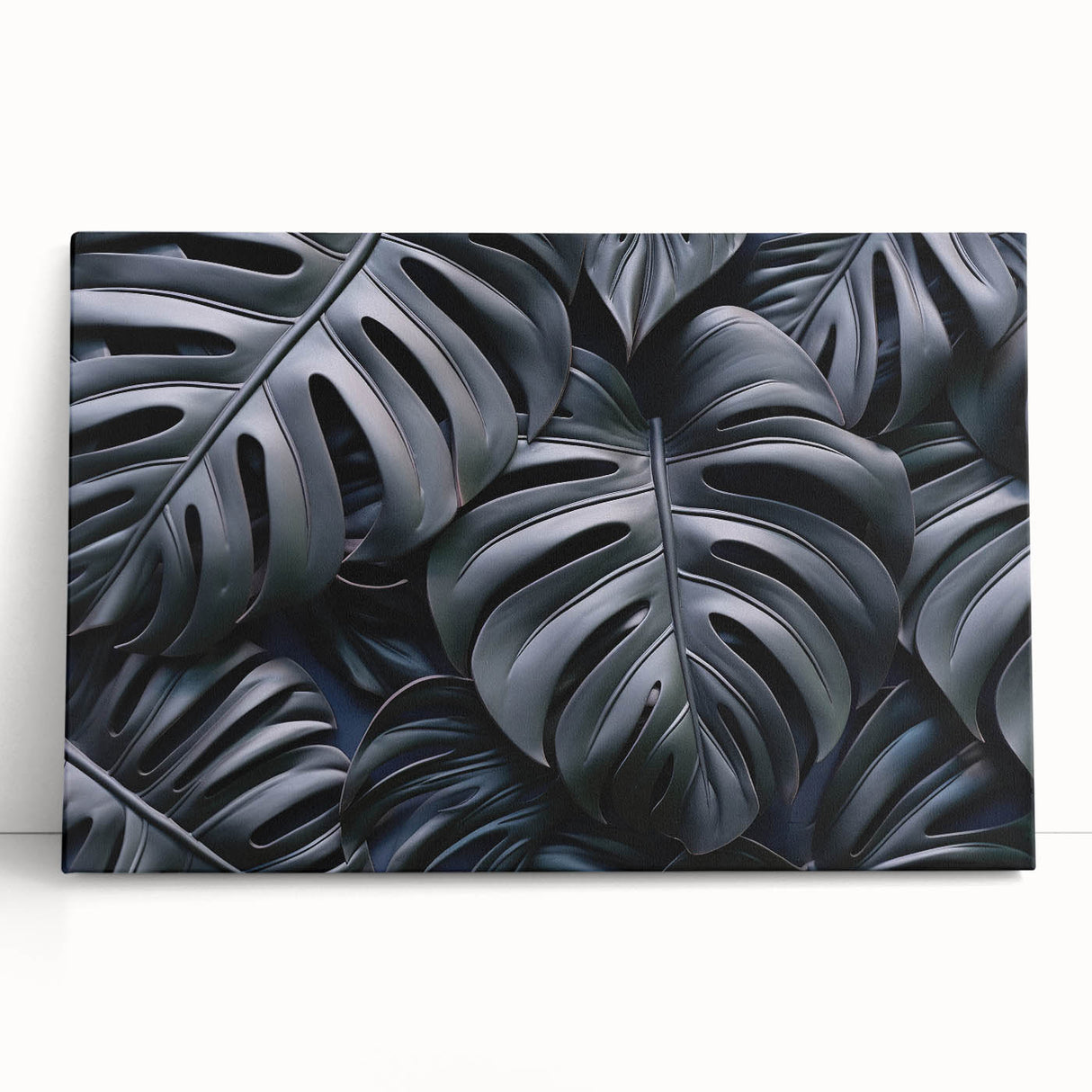 Vibrant botanical wall art featuring a lush monstera leaf design on stretched canvas, ideal for home decor, showcasing rich green tones against a neutral background.