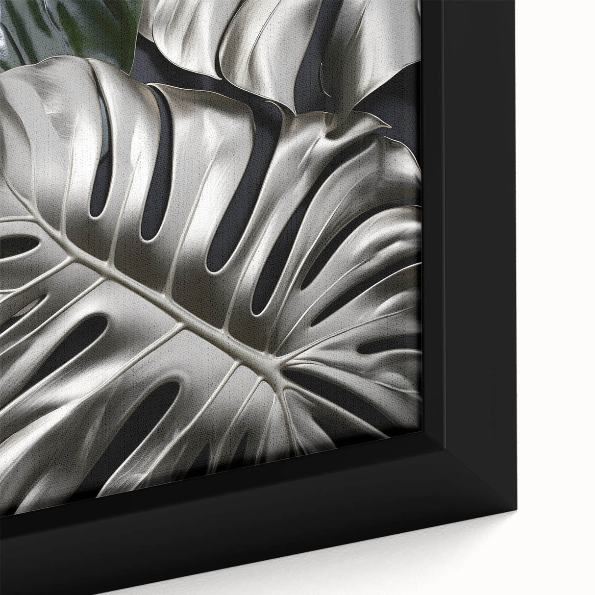 Close-up view of a framed botanical wall art piece featuring a vibrant Monstera plant design, showcasing rich green tones and intricate leaf details, ideal for home decor.