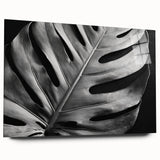 Acrylic glass wall art featuring a vibrant botanical monstera design with colorful flowers, showcased in a side view, ideal for home decor and plant enthusiasts.