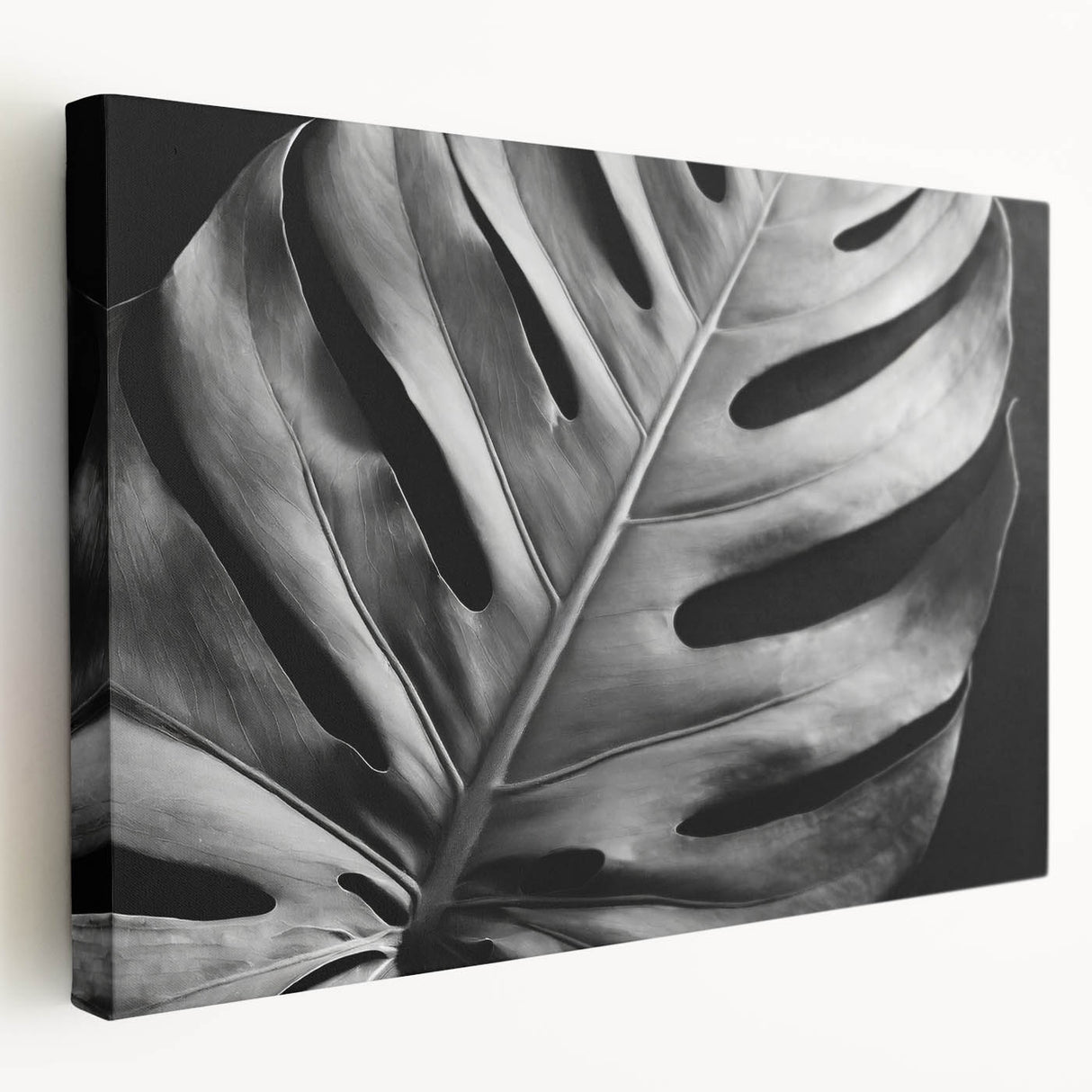 Stretched canvas wall art showcasing a vibrant botanical Monstera design, featuring lush green leaves against a neutral background, perfect for home decor.