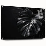Colorful botanical wall art featuring a Monstera leaf design printed on acrylic glass, displayed from a side view with decorative pins, perfect for home decor.