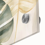 Close-up of a vibrant botanical wall art design featuring a lush Monstera leaf, elegantly displayed in acrylic glass, showcasing intricate details and rich colors. Perfect for enhancing home decor with a modern, tropical aesthetic.
