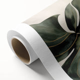 Botanical wall art design showcasing a vibrant monstera leaf illustration on rolled canvas, perfect for adding a tropical flair to home decor.