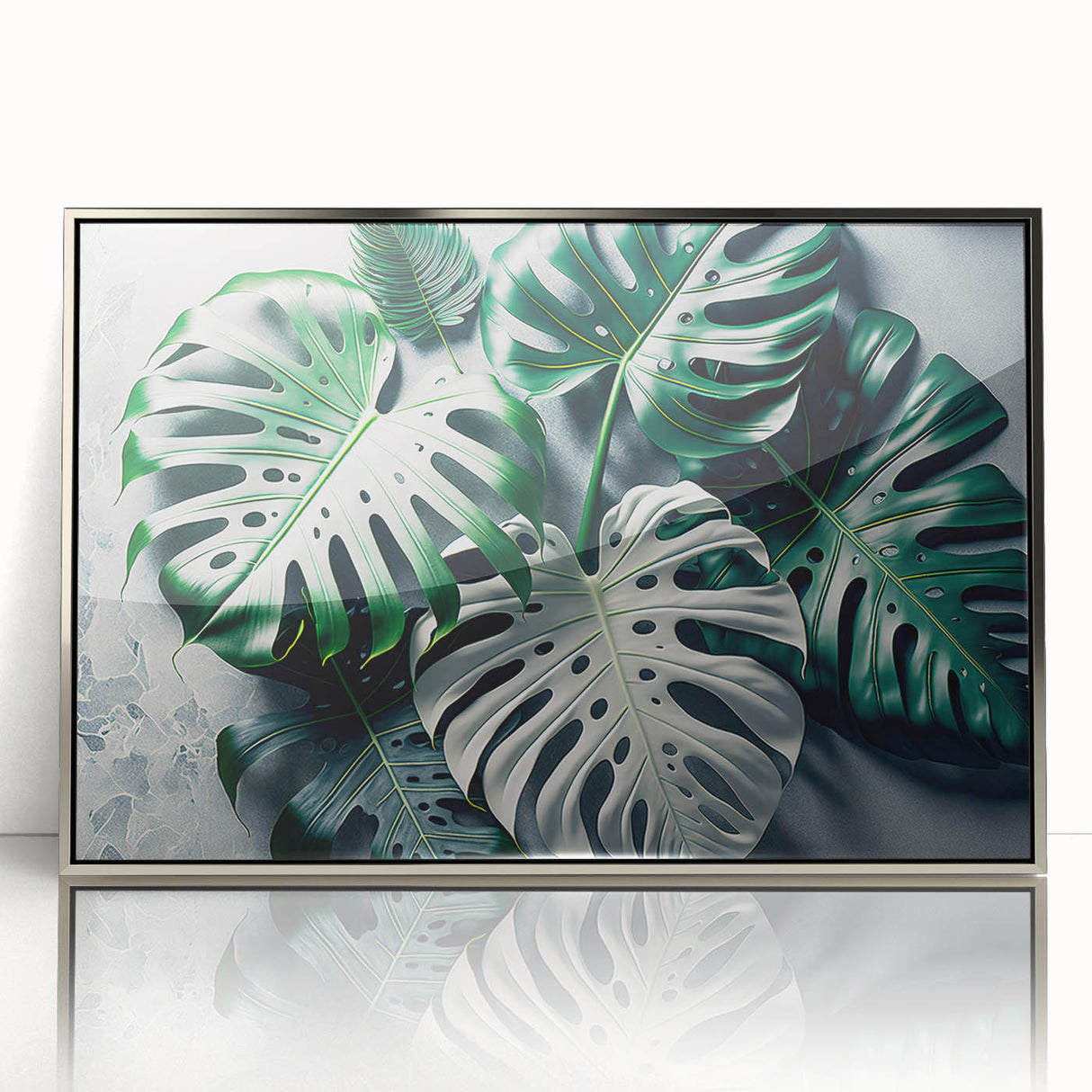 Framed botanical wall art featuring a Monstera design with vibrant green leaves, set in a sleek silver frame, perfect for enhancing modern home decor.