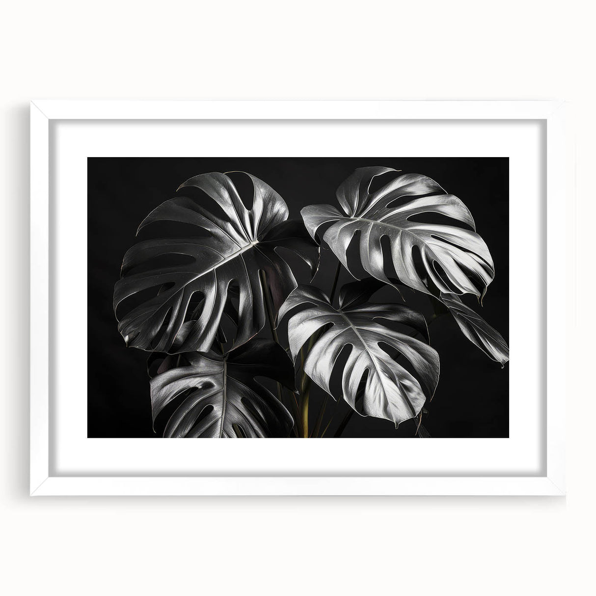 Botanical wall art collection showcasing a Monstera leaf design framed in white, highlighting vibrant green hues and intricate details, ideal for home decor.