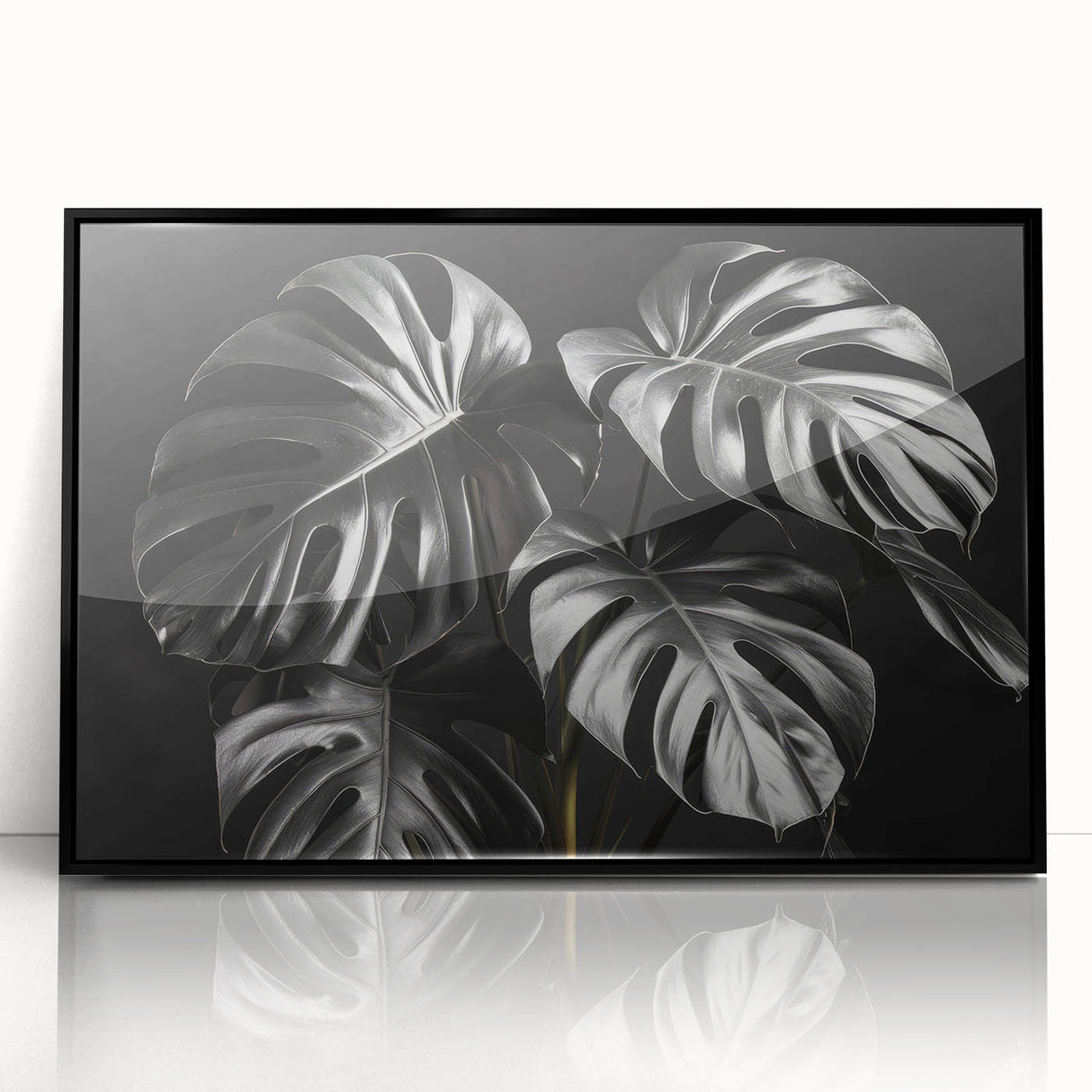 Framed wall art featuring a botanical monstera design in vibrant green tones, displayed against a sleek black frame, perfect for modern home decor and plant enthusiasts.
