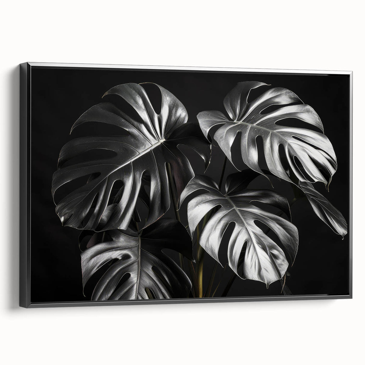 Framed botanical wall art featuring a Monstera leaf design on a black background, showcasing vibrant green hues and elegant framing, ideal for modern decor.