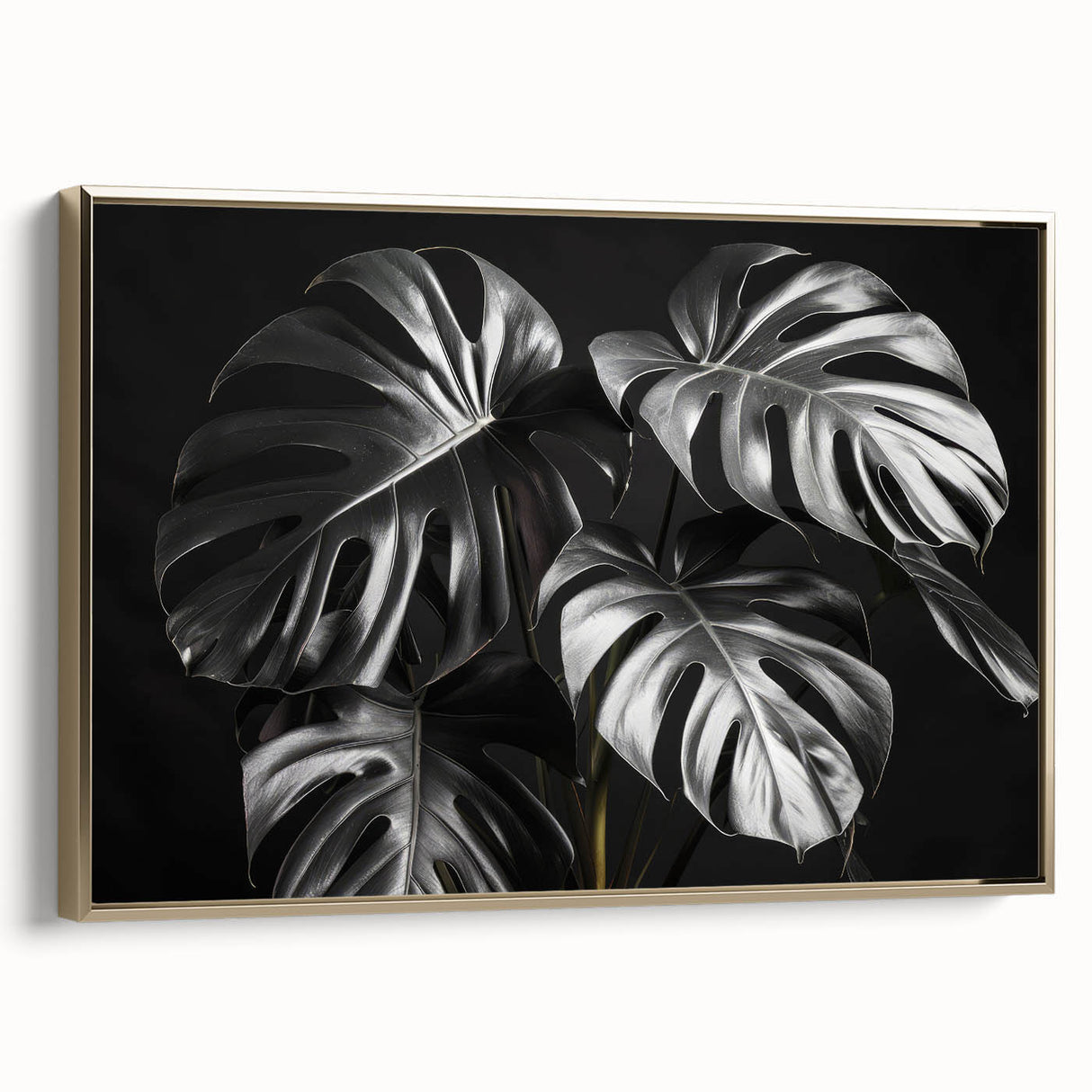 Framed wall art featuring a botanical Monstera design in gold, showcasing lush green leaves on a canvas. Ideal for modern home decor, adding an elegant touch to any room.