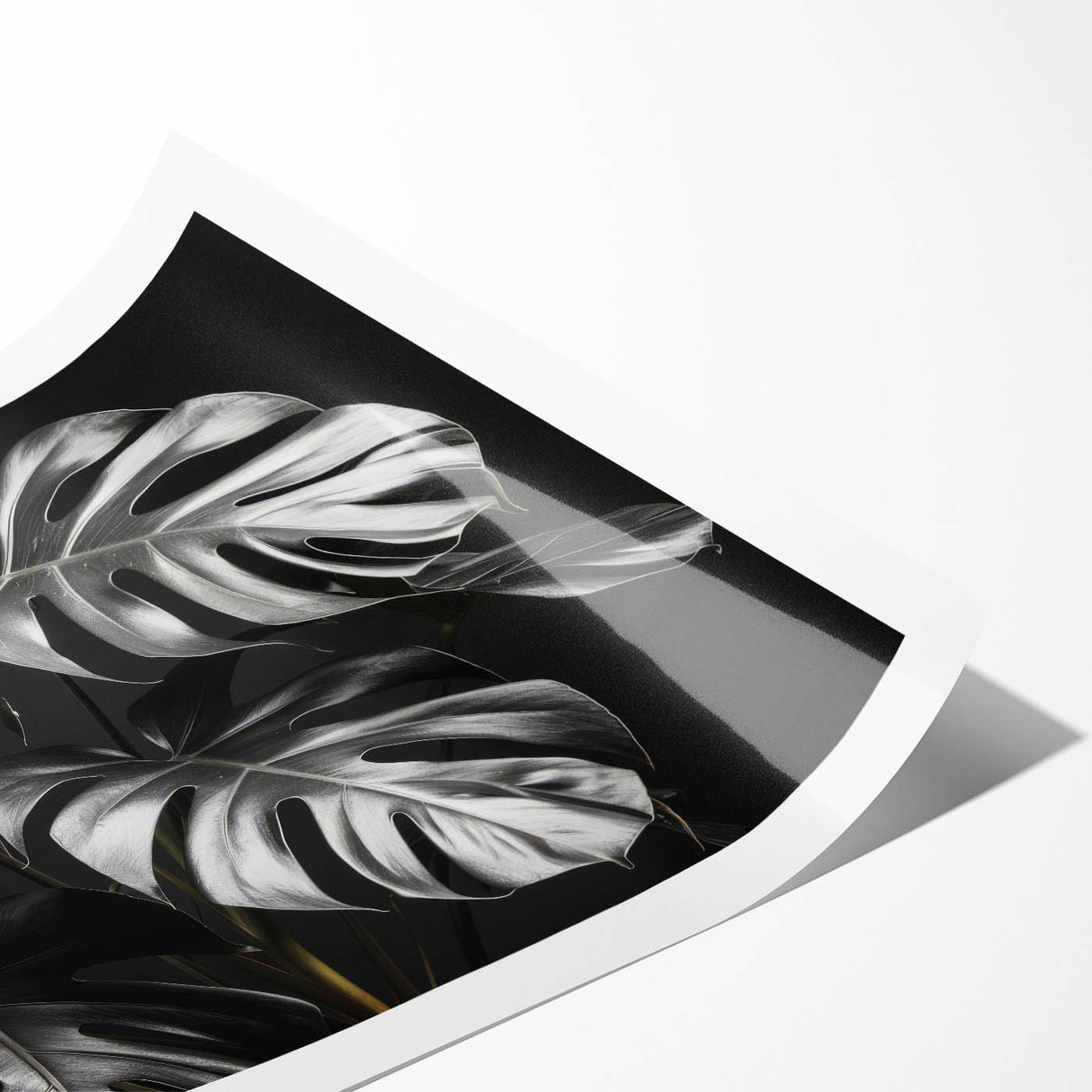 Botanical wall art print featuring a vibrant monstera leaf design in shades of green, elegantly rolled for easy framing and display, perfect for adding a tropical touch to home decor.