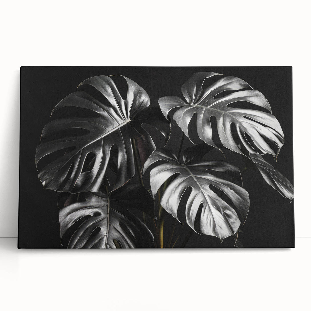Stretched canvas wall art showcasing a vibrant botanical monstera design, featuring lush green leaves against a neutral background, ideal for home decor.