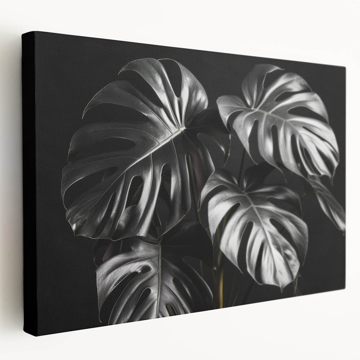 Stretched canvas wall art featuring a vibrant botanical Monstera design, showcasing lush green leaves against a neutral background, ideal for home decor.
