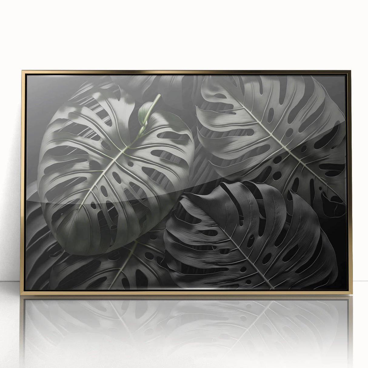 Framed botanical monstera wall art featuring vibrant green leaves encased in a sleek gold frame, perfect for adding a touch of nature to modern decor.