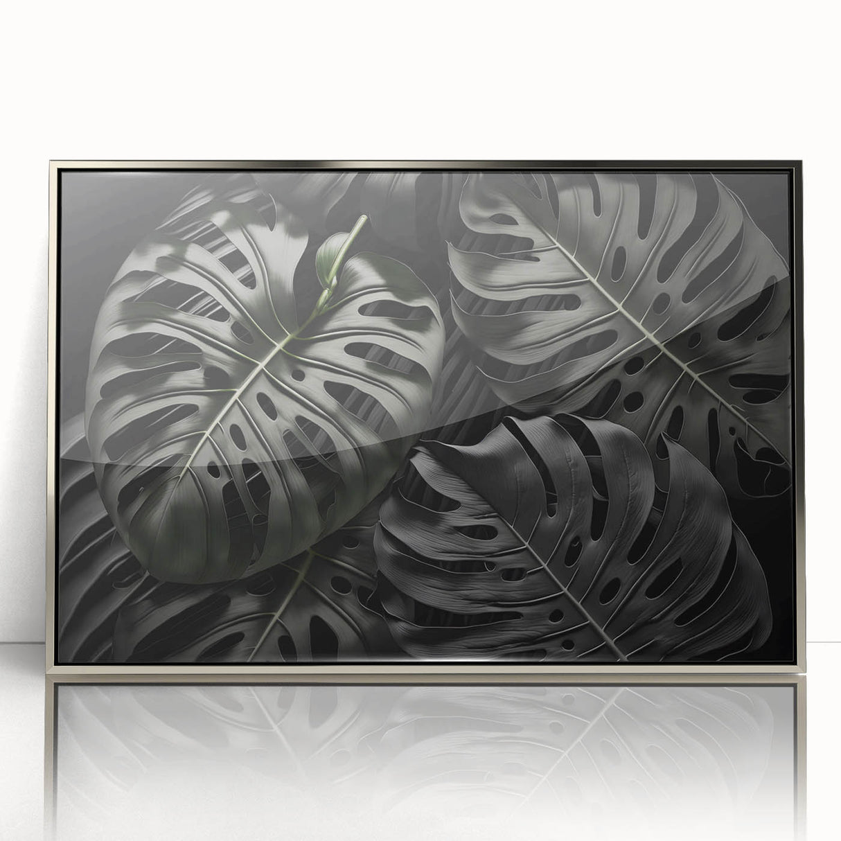 Framed wall art featuring a botanical Monstera design in vibrant green hues, accented with a sleek silver frame, perfect for modern home decor.