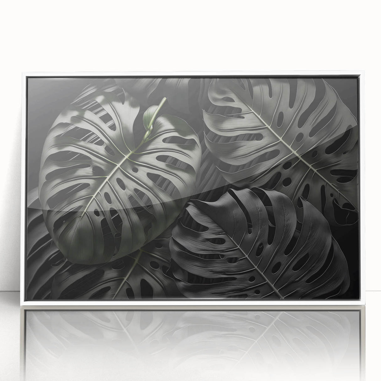 Framed wall art showcasing a botanical monstera design in vibrant green hues, set against a sleek white background, ideal for modern home decor.
