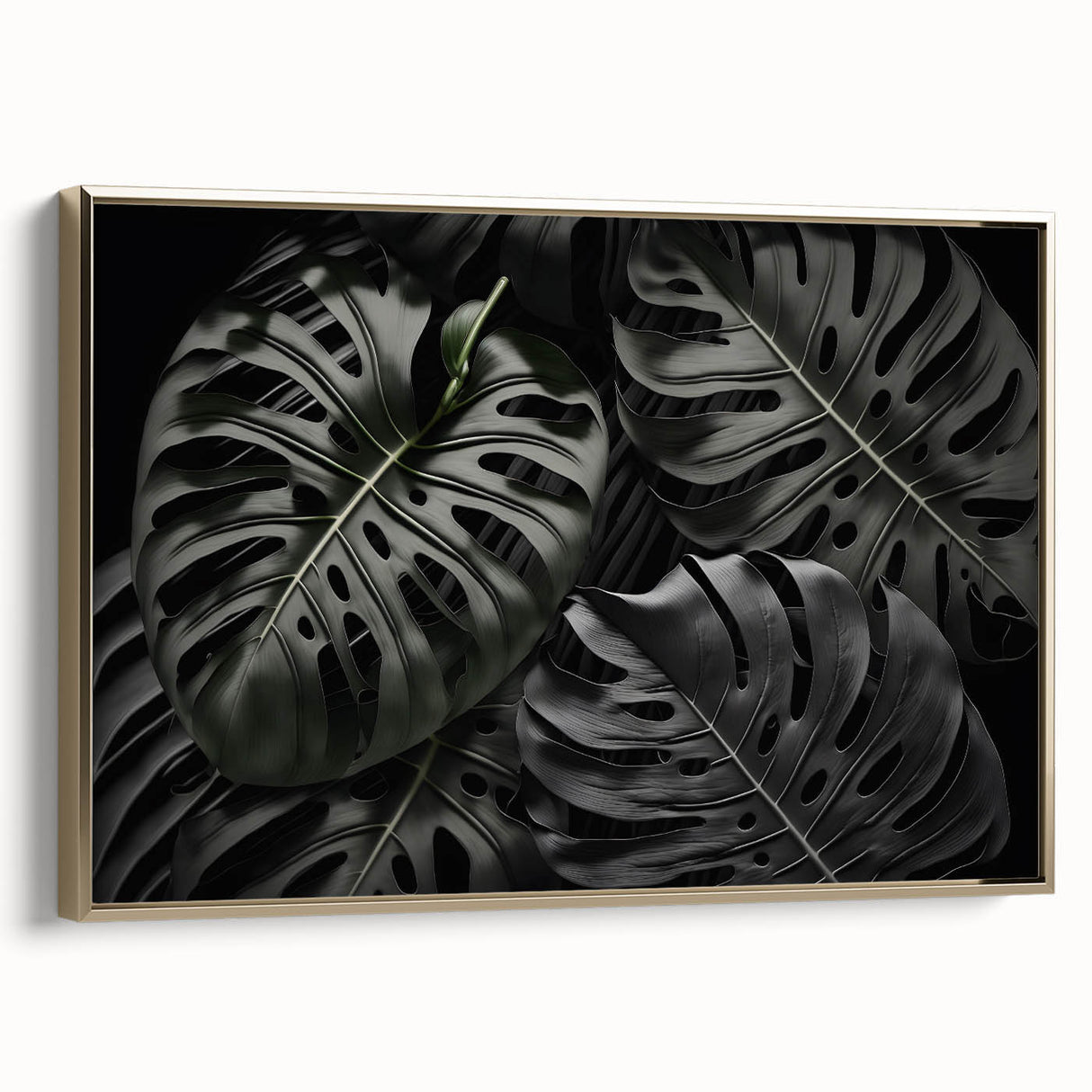 Framed canvas wall art showcasing a botanical monstera design with vibrant green leaves, elegantly displayed with a gold frame against a neutral background.